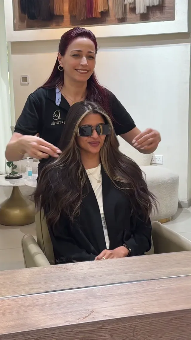 Finished hair extensions being styled