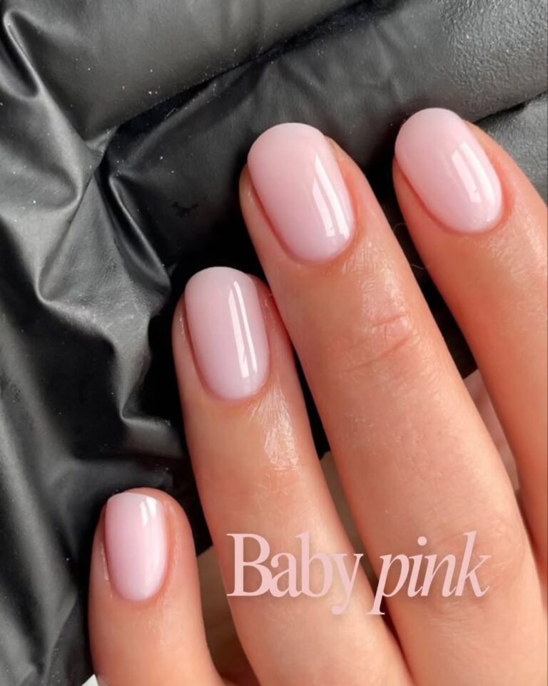 Pink gel manicure close up